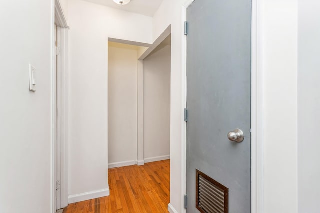 hallway featuring light hardwood / wood-style flooring