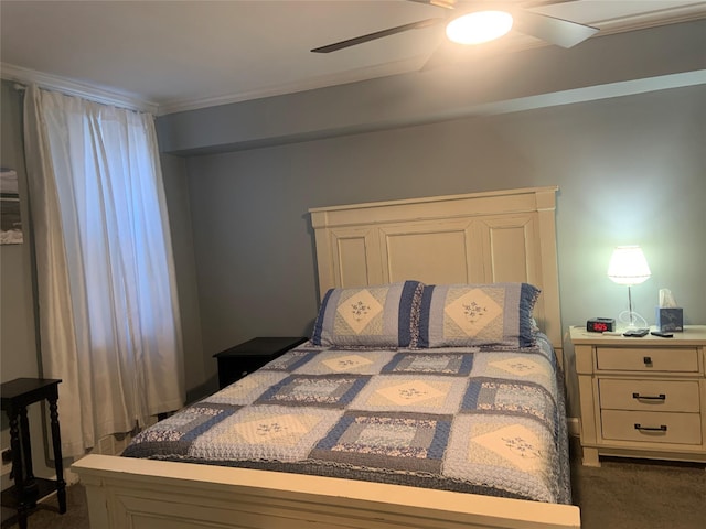 carpeted bedroom featuring ornamental molding and ceiling fan