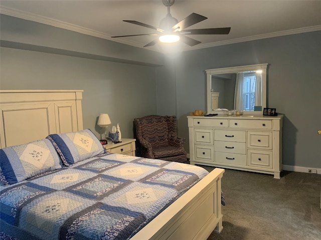 carpeted bedroom with ceiling fan and ornamental molding