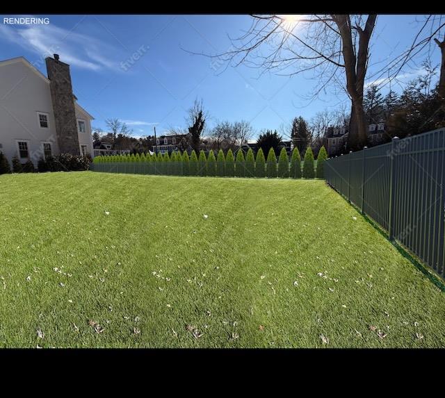 view of yard with fence