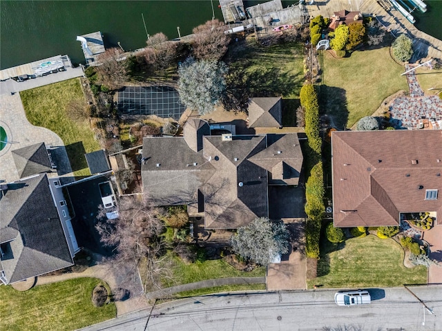 birds eye view of property featuring a water view