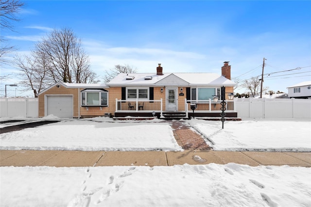 view of front of property featuring a garage