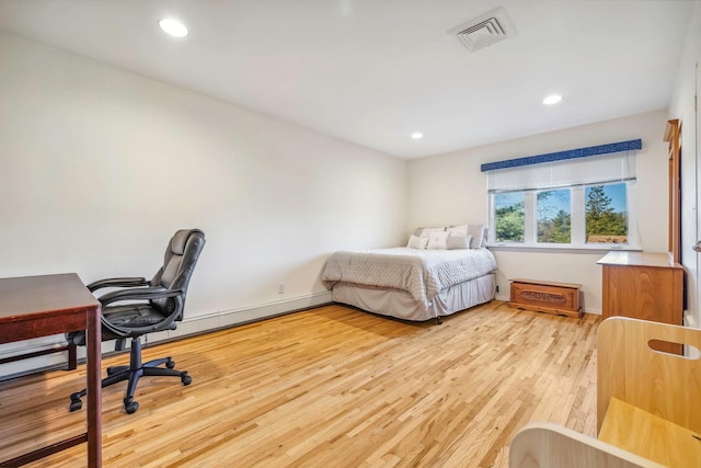 bedroom with light hardwood / wood-style floors