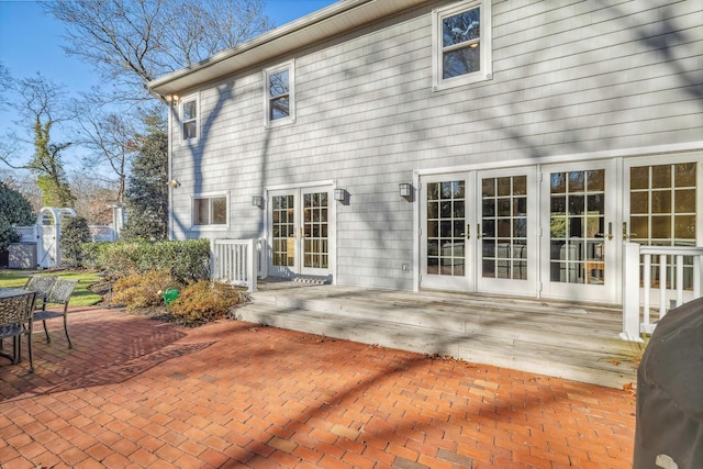 rear view of property with a patio and french doors