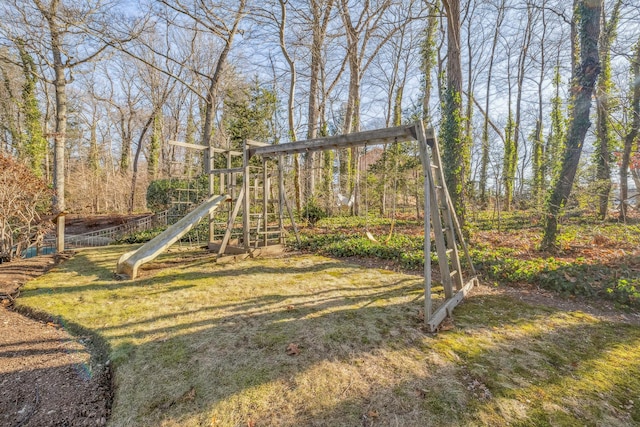 view of jungle gym featuring a yard