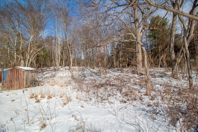 view of snow covered land