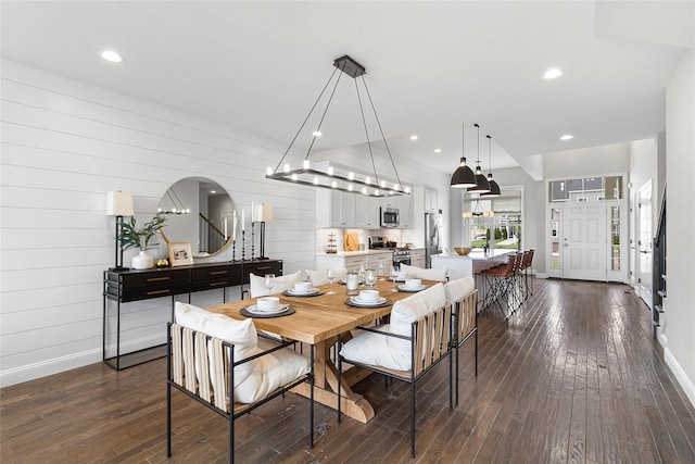 dining area featuring dark hardwood / wood-style flooring