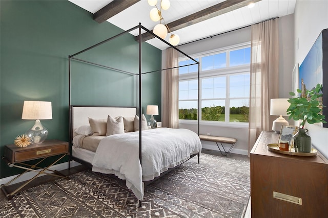 bedroom featuring beam ceiling