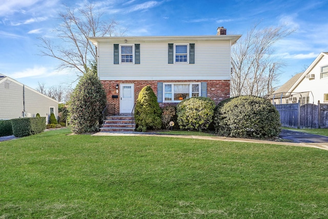 view of front property with a front lawn