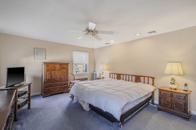 bedroom featuring dark carpet and ceiling fan