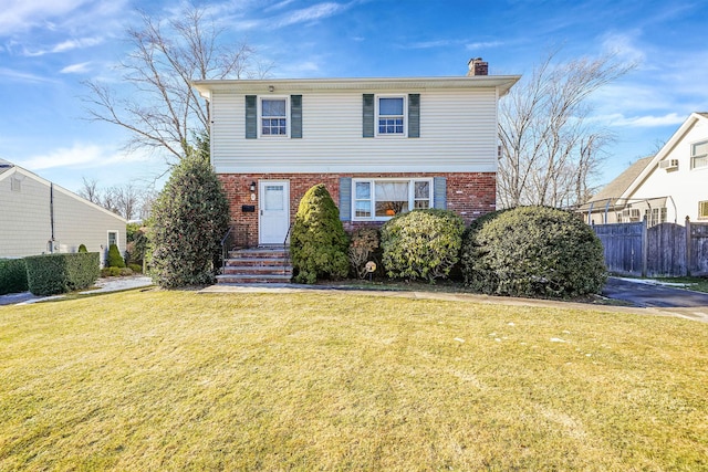 view of front property with a front lawn