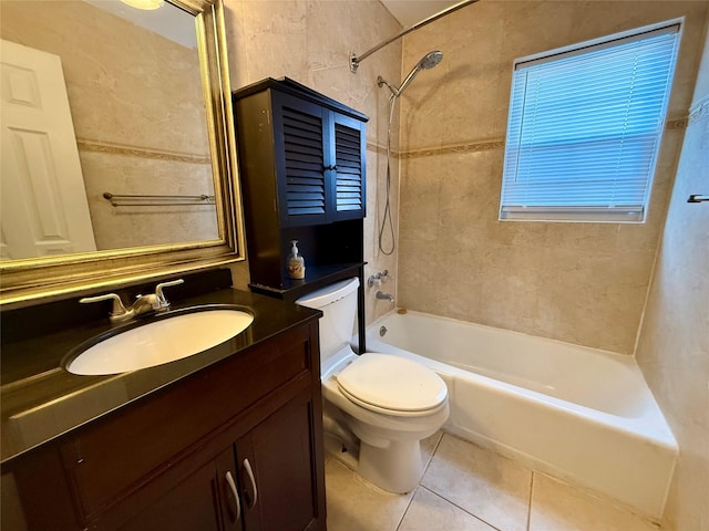 full bathroom featuring vanity, toilet, tile patterned floors, and tiled shower / bath combo