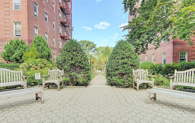 surrounding community featuring a patio