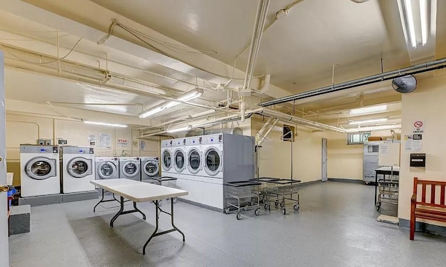 laundry area with separate washer and dryer