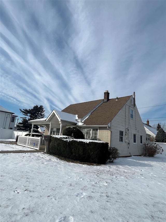 view of snow covered property