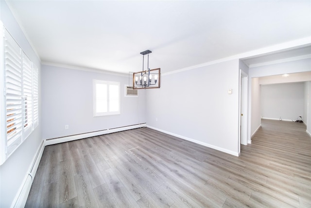 unfurnished dining area featuring a baseboard radiator, ornamental molding, and light wood-type flooring