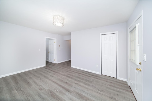 unfurnished bedroom featuring light hardwood / wood-style flooring