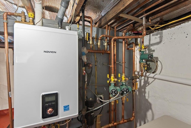 utility room with tankless water heater