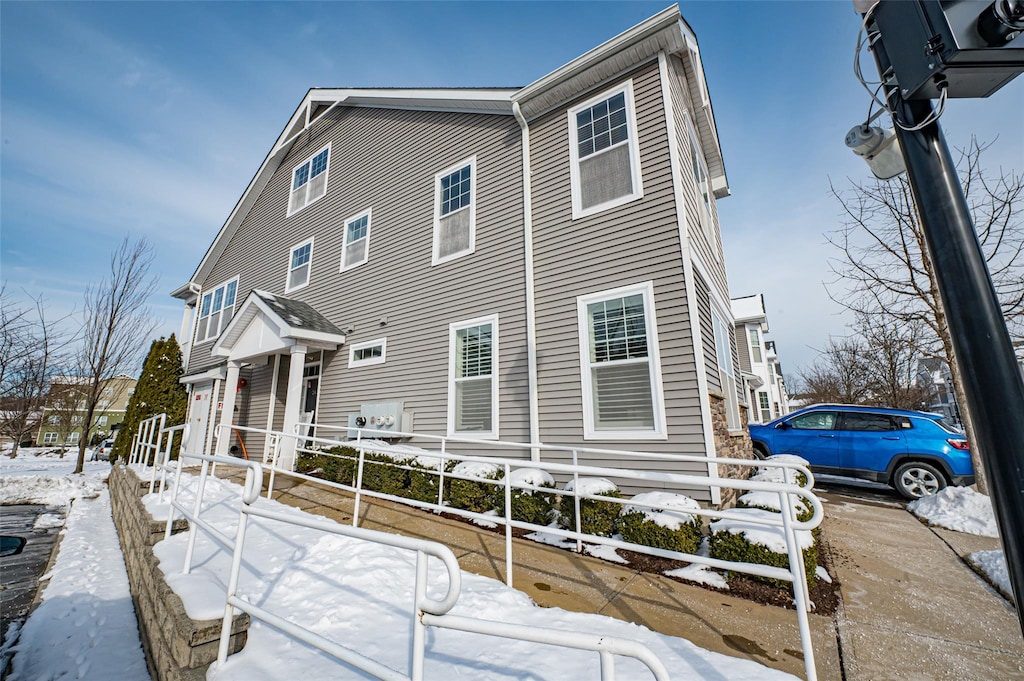 view of snow covered property