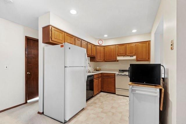 kitchen featuring white appliances