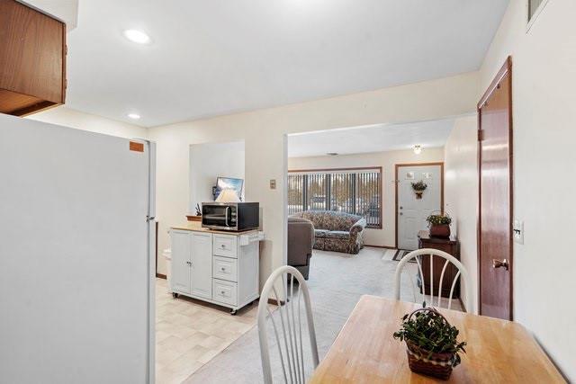 view of carpeted dining room