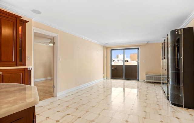 spare room featuring ornamental molding