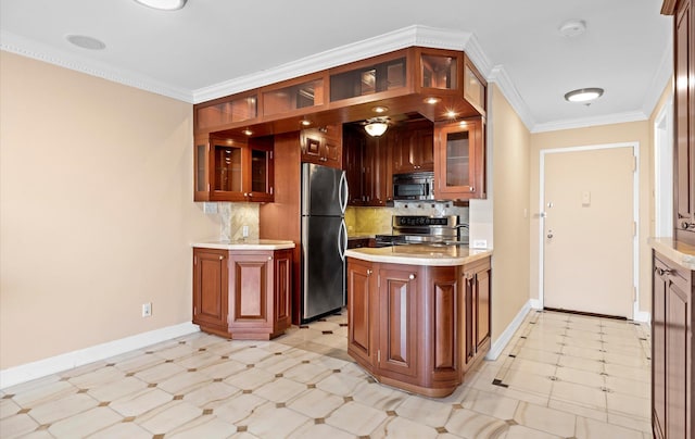 kitchen featuring crown molding, appliances with stainless steel finishes, and decorative backsplash