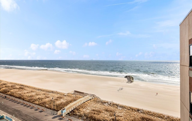 property view of water featuring a beach view