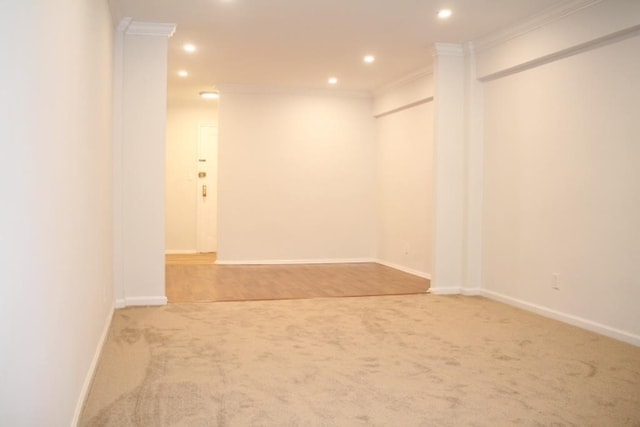 carpeted spare room with ornamental molding