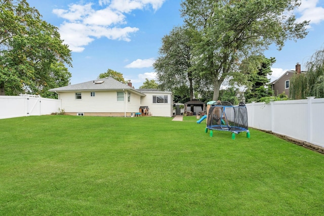 view of yard featuring a trampoline