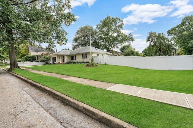 exterior space featuring a front lawn