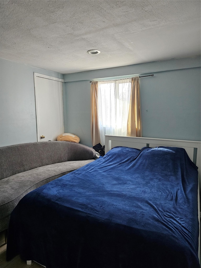 bedroom with a textured ceiling