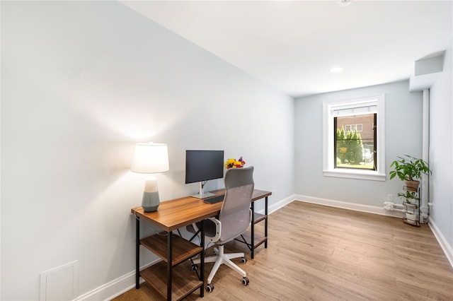 office area featuring light hardwood / wood-style flooring