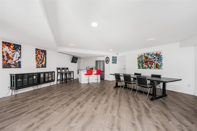 dining room featuring wood-type flooring