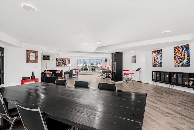 dining room with light hardwood / wood-style flooring