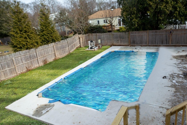 view of pool featuring a fenced backyard, a fenced in pool, and a lawn