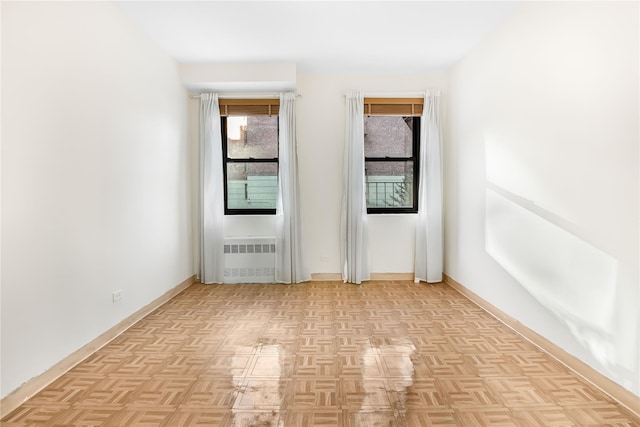 empty room featuring radiator