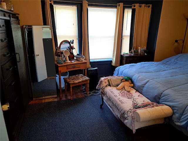 bedroom featuring carpet flooring