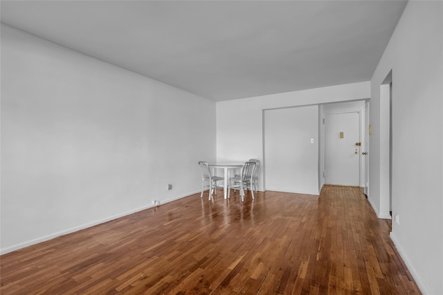 empty room featuring wood-type flooring