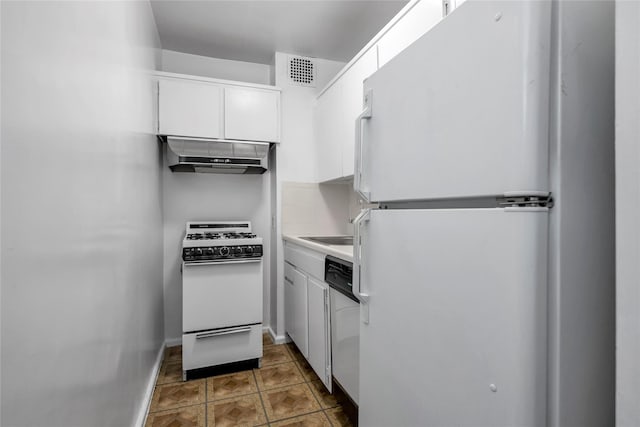 kitchen featuring sink, white appliances, and white cabinetry