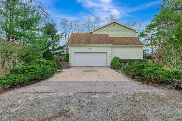 view of home's exterior with a garage