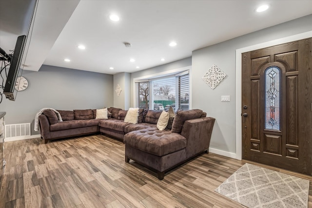 living room with hardwood / wood-style flooring