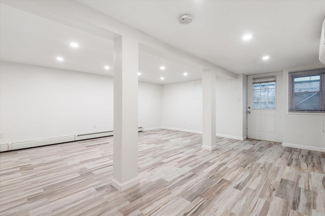 basement featuring light wood-type flooring