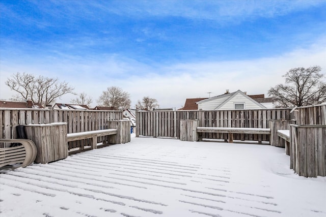 view of snow covered deck