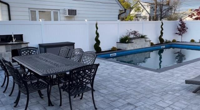 view of swimming pool featuring a patio