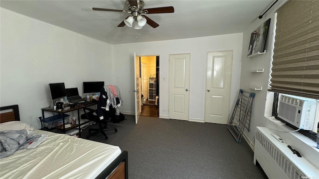 bedroom featuring ceiling fan, dark carpet, cooling unit, and radiator heating unit