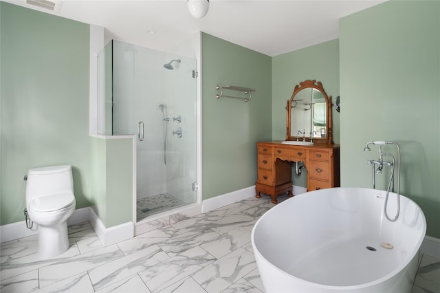 full bathroom featuring vanity, shower with separate bathtub, and toilet