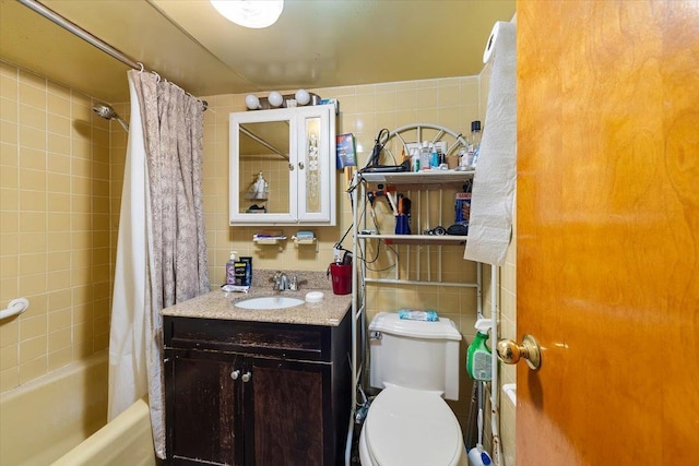 full bathroom featuring tile walls, decorative backsplash, vanity, toilet, and shower / bathtub combination with curtain