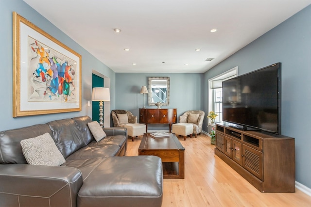 living room featuring light wood-type flooring