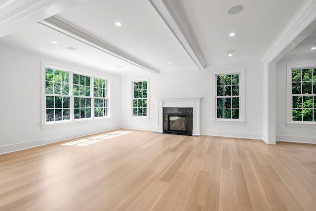 85 Dorchester Dr, Manhasset, NY 11030 - unfurnished living room with crown molding, light wood-type flooring, baseboards, a fireplace, and beamed ceiling